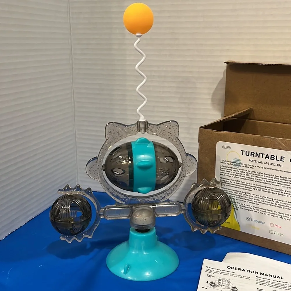 Turntable cat treat toy